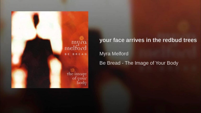 your face arrives in the redbud trees